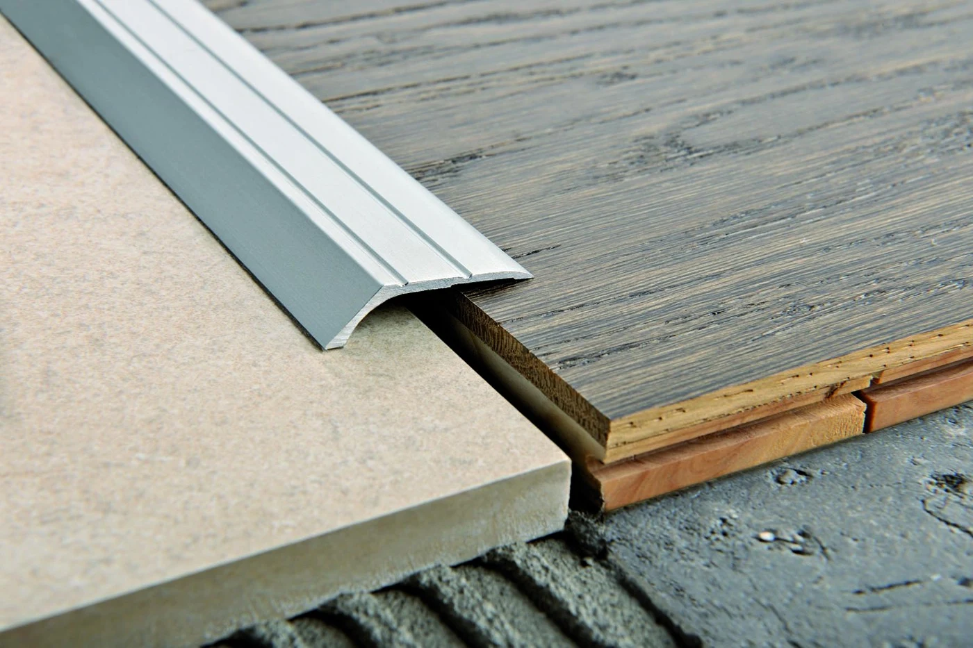 Profil de trecere plat pentru parchet si gresie Prolevall 29 Progress Profiles | 29 mm latime, 5,5 mm inaltime, acelasi nivel, autoadeziv sau perforat – bara 2,7 m Profil de trecere plat pentru parchet si gresie Prolevall 29 Progress Profiles | 29 mm latime, 5,5 mm inaltime, acelasi nivel, autoadeziv sau perforat – bara 2,7 m